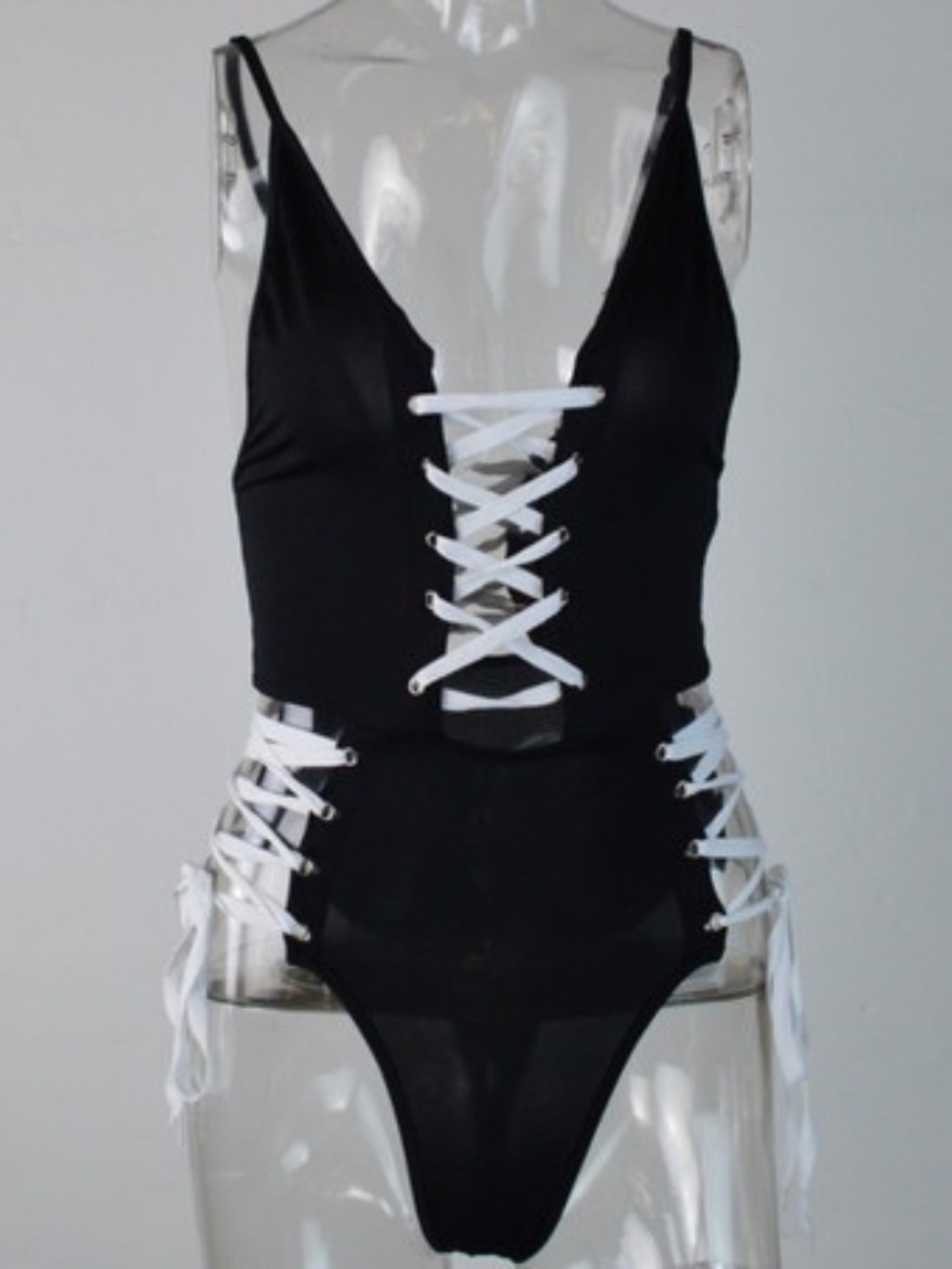 Black and white lace up one piece bodysuit